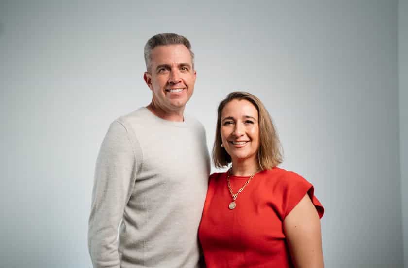 A smiling couple who lead a Believer Church small group