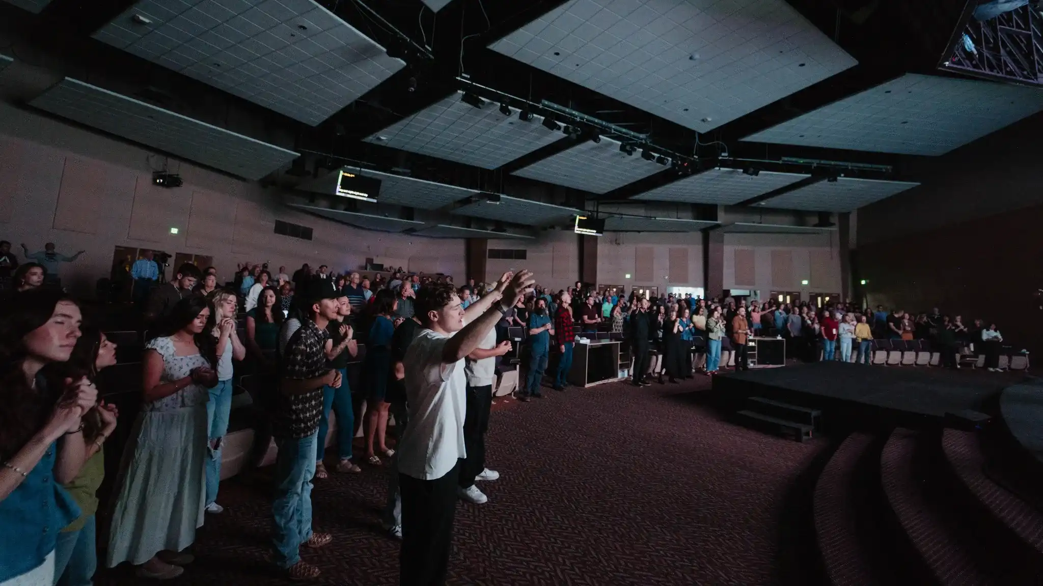 Congregation standing together during a church service