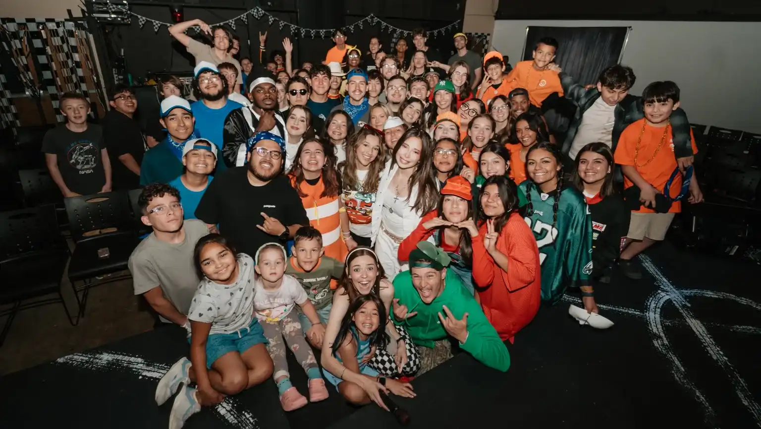 Children, teenagers, and serve team leaders posing together at BC Kids